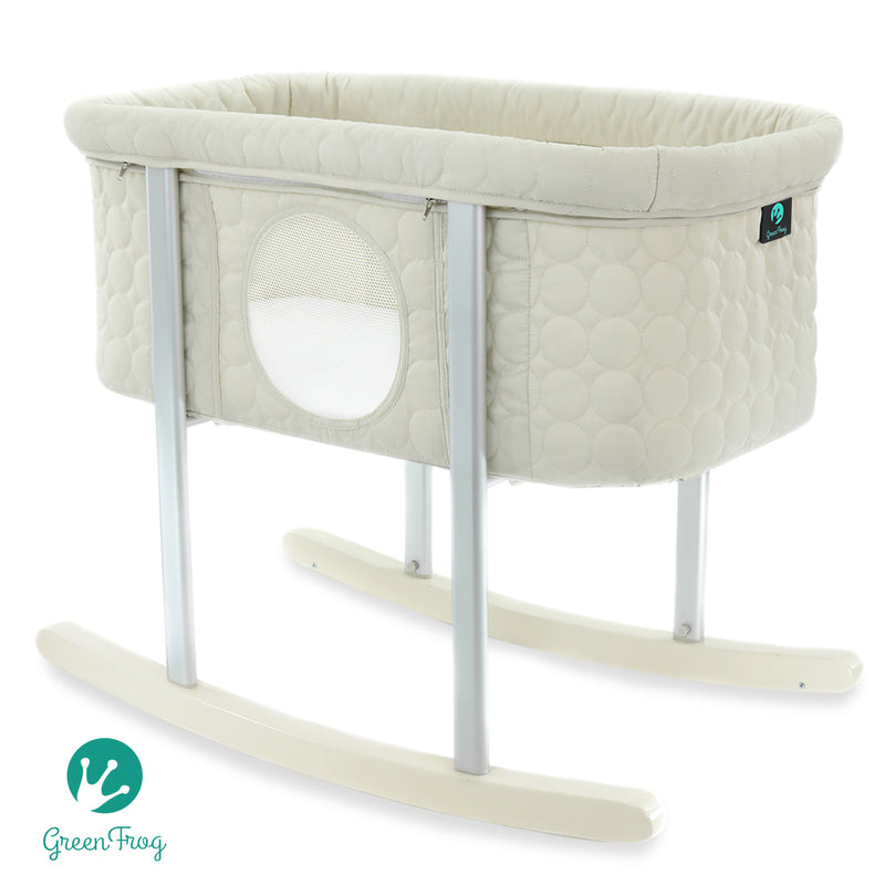 Choose Mega babies’ Green Frog bassinet in a neutral sand color, with a circle pattern.