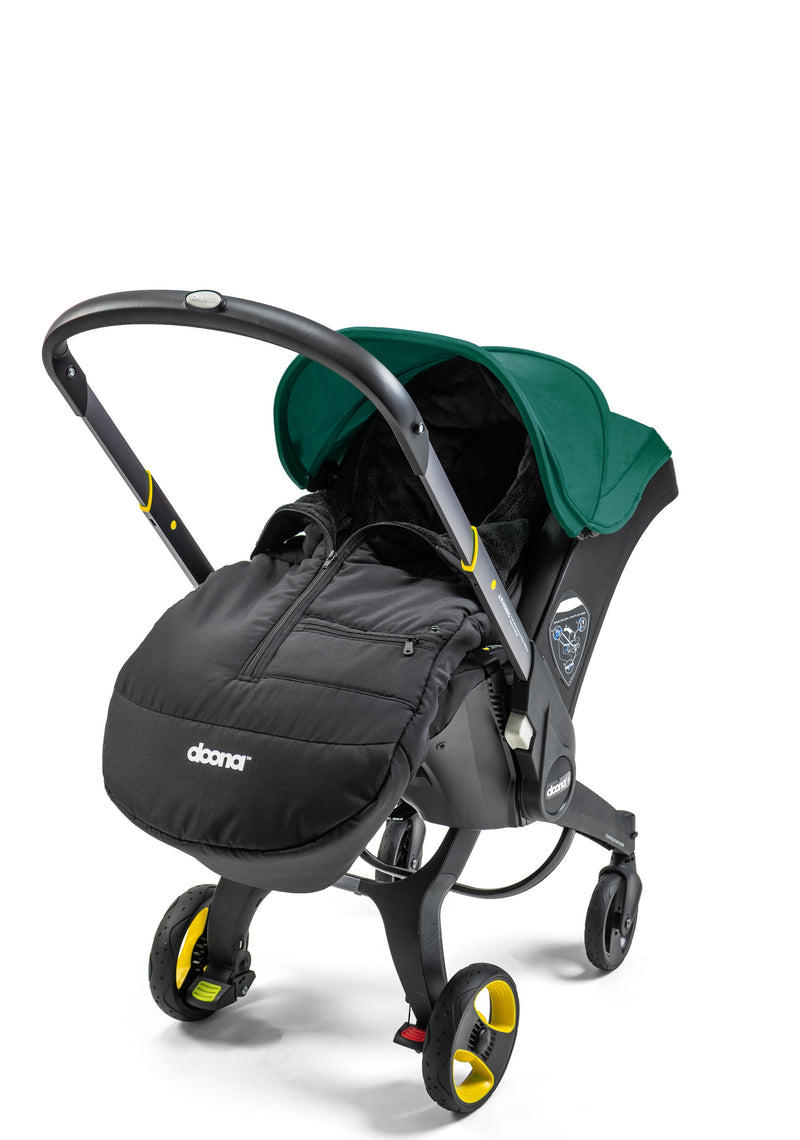 The Doona footmuff featured by Mega babies, easily attaches to strollers and car seats.