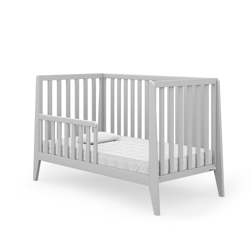 Transform a crib to a bed with dadada's 3-in-1 toddler bed rail from Mega babies.